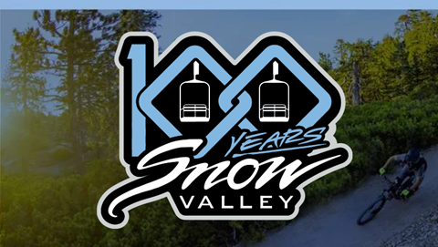 Blue overlay on a bike park image with the Snow Valley logo 100 year anniversary