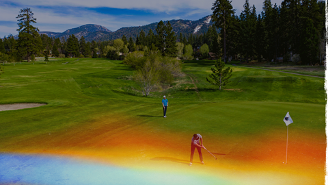 gradient colorful overlay on a photo with two golfers on the greens