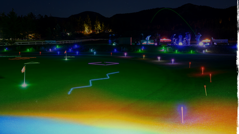 Lite up putting range with lights in the mountains at bear mountain golf course