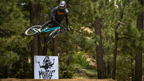 Mountain biker on a jump during the Muscle Beach Jam competition