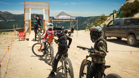 Kiddo mountain bikers at the top of Snow Valley's Chair 1 waiting to hit the Southwest Downhill race event.