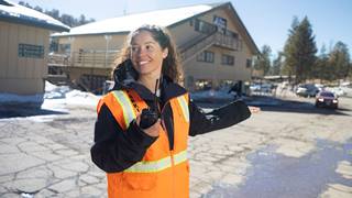 parking staff directing guests on where to park in the bear mountain parking lot