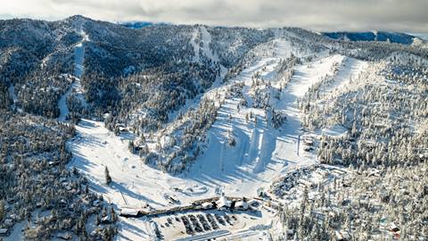 Drone image of a sunny day with mixed clouds at Bear Mountain